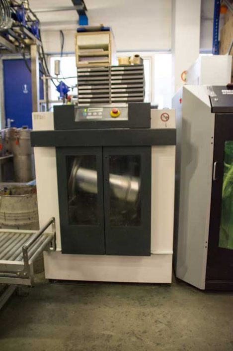 Maschine die einen Eimer schüttelt